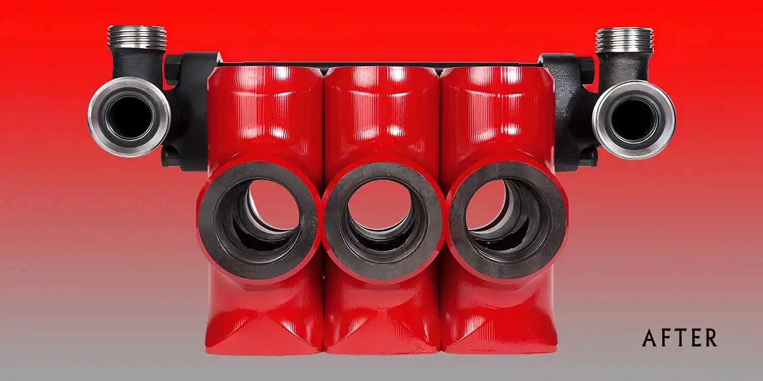 Fluid End of a mud pump shown red gradient background